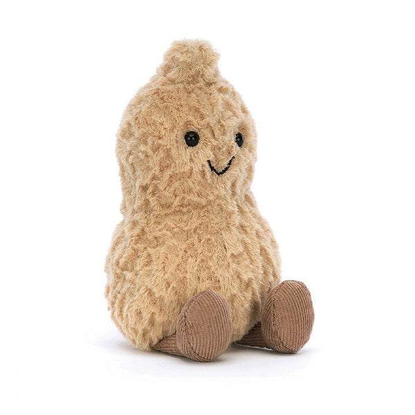 Amuesables plush toy by Jellycat resembling a peanut with a soft beige shell, chocolate boots, and a tuft of hair on top.
