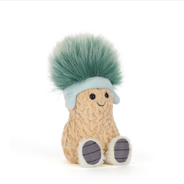 Plush toy resembling peanut with a blue hat on a white background